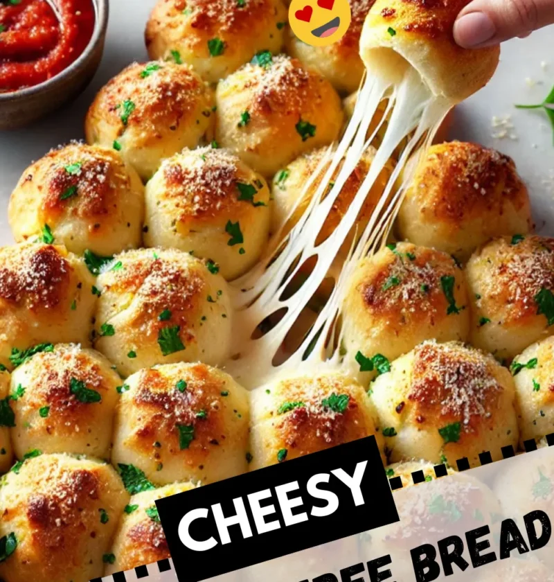 Festive Cheesy Christmas Tree Bread served with warm pizza sauce.